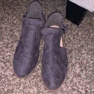 Grey cutout ankle booties by the brand Reneeze